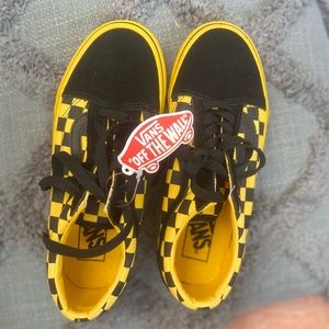 New black and yellow checkered “off-the-wall” Vans.